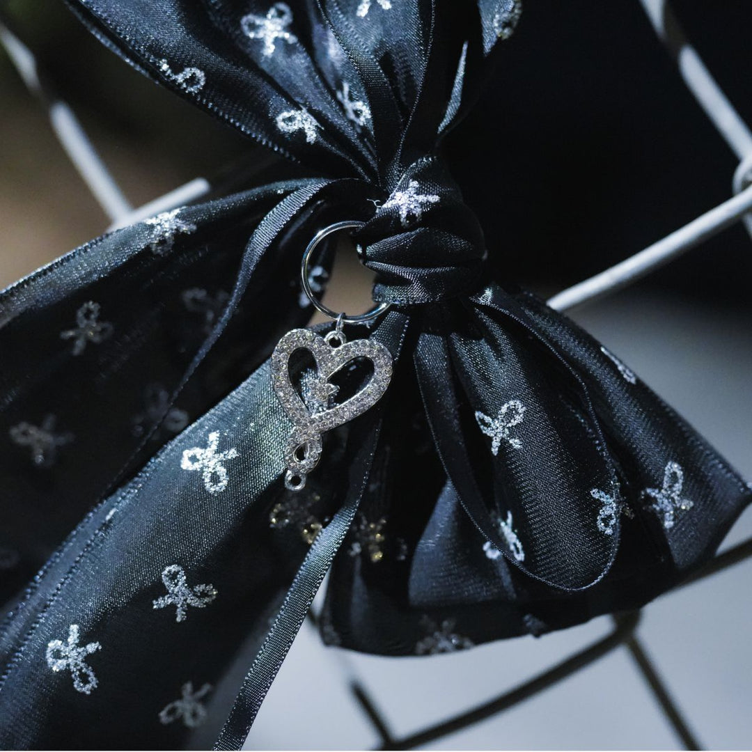Karmas a Bow in Black